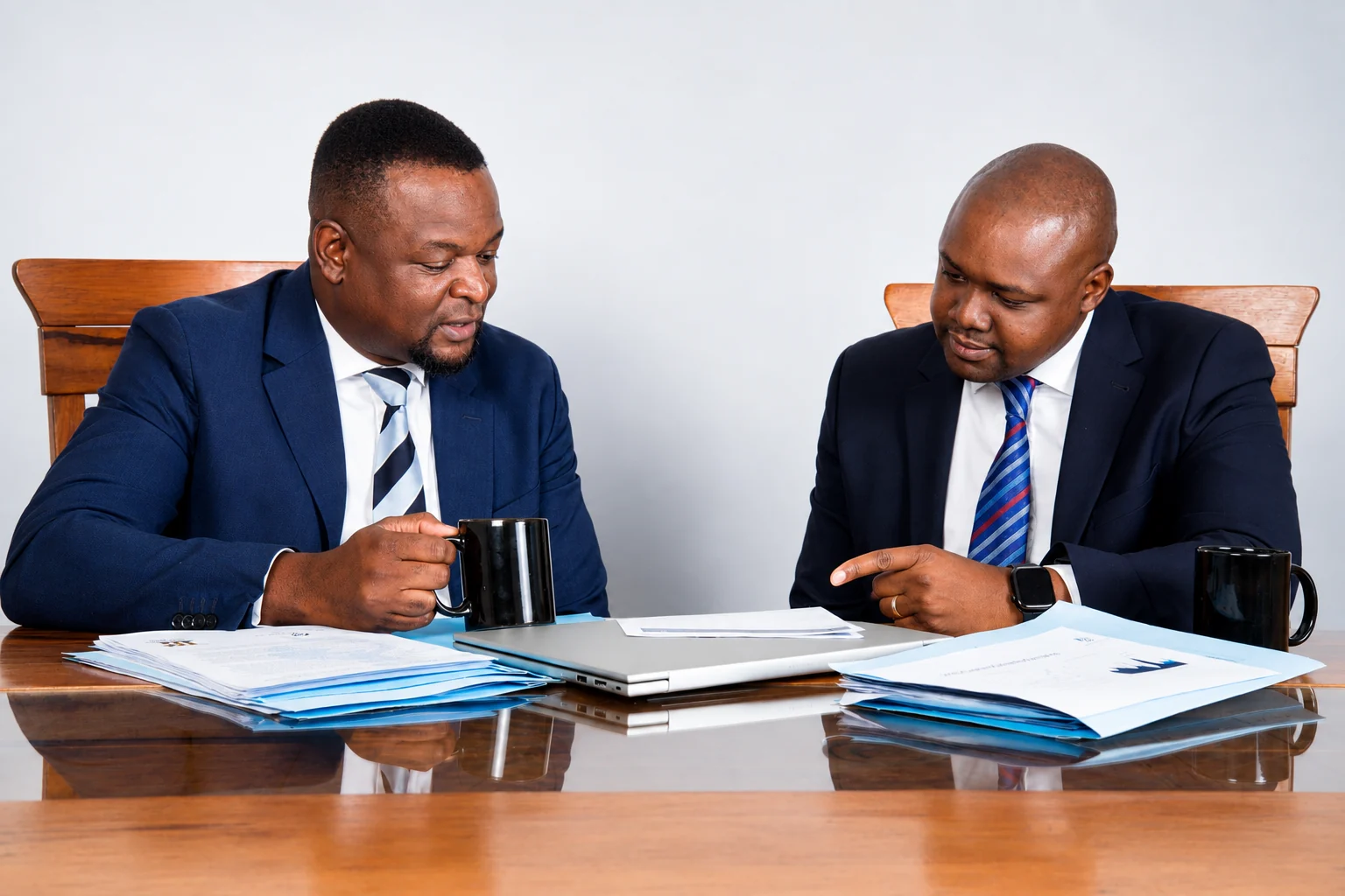 Morgan & Co professionals in discussion